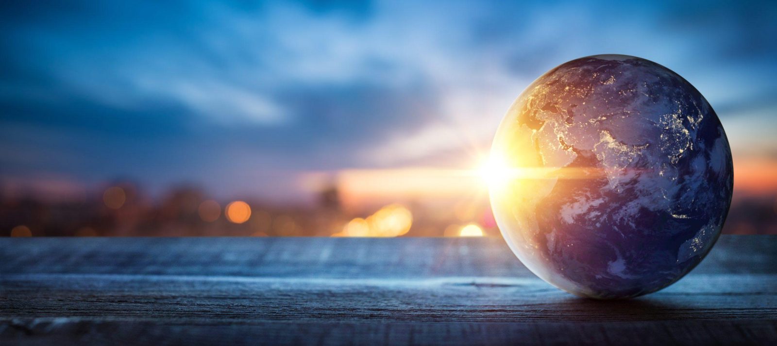 Planet earth on the background of blurred lights of the city. Concept on business, politics, ecology and media. Elements of this image furnished by NASA